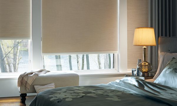 Designer-room-darkening-roller-shades-in-bedroom